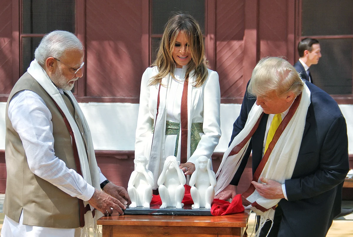 US President Donald Trump with First Lady Melania Trump and Prime Minister Narendra Modi, at Sabarmati Ashram in Ahmedabad on Monday