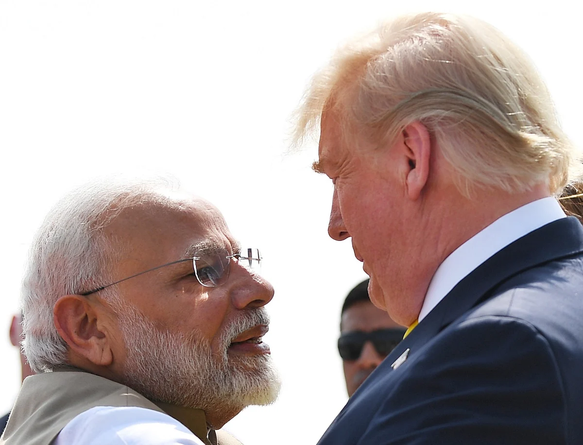 Prime Minister Narendra Modi hugs US President Donald Trump, at Sardar Vallabhbhai Patel International Airport in Ahmedabad on Monday