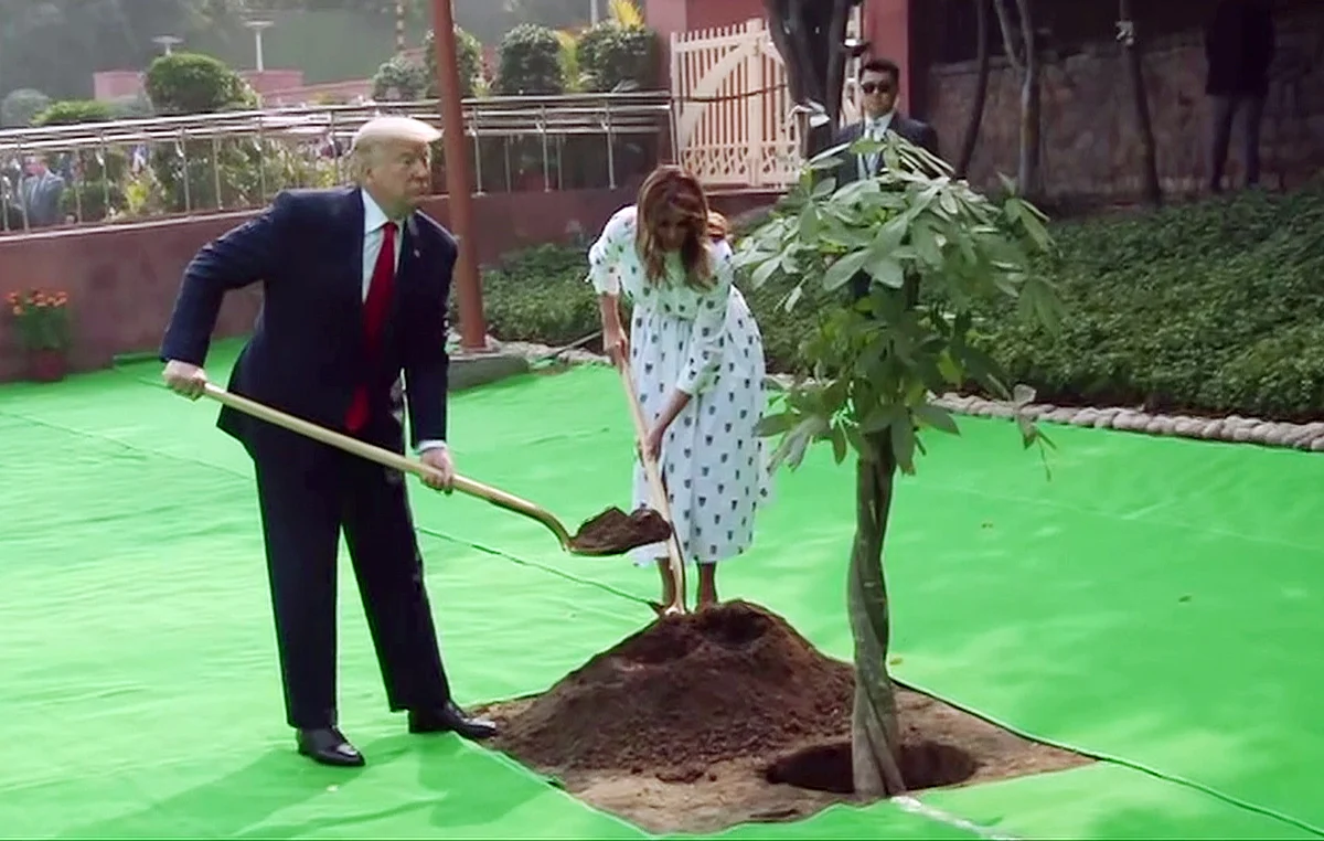 US President Donald Trump and First Lady Melania Trump planting a tree at Rajghat, in New Delhi on Tuesday.