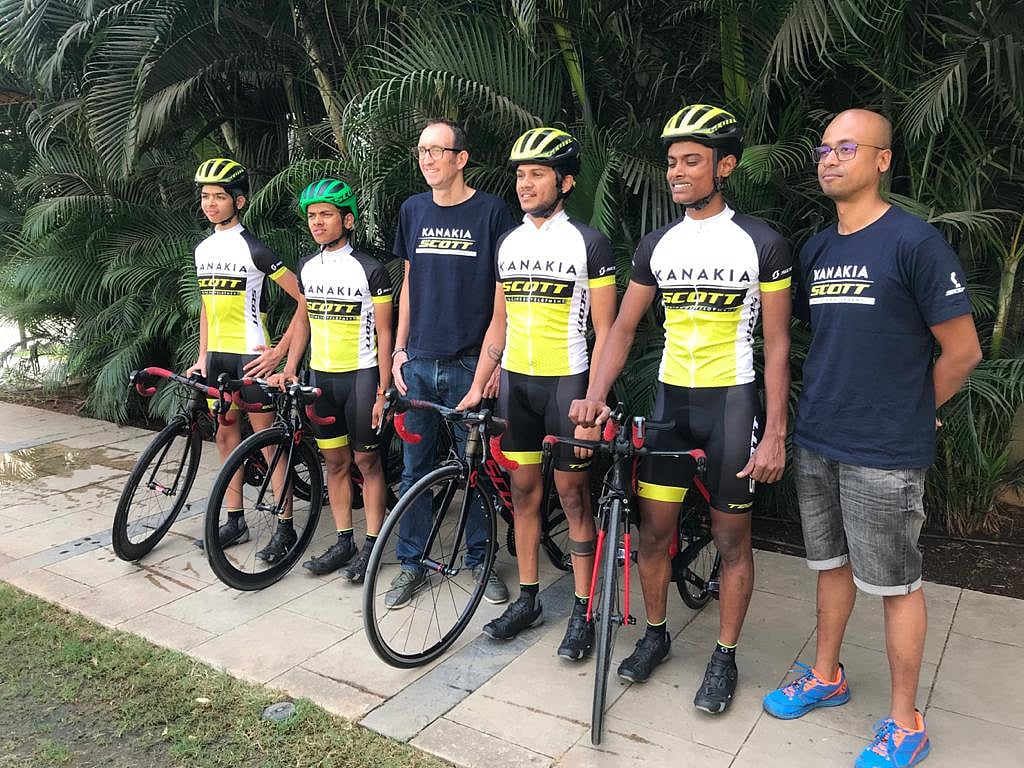Nigel Smith (3rd left) with his team