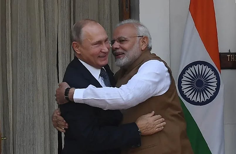 Prime Minister Narendra Modi and Russian President Vladimir Putin hug before a meeting at Hyderabad House in New Delhi on October 5, 2018