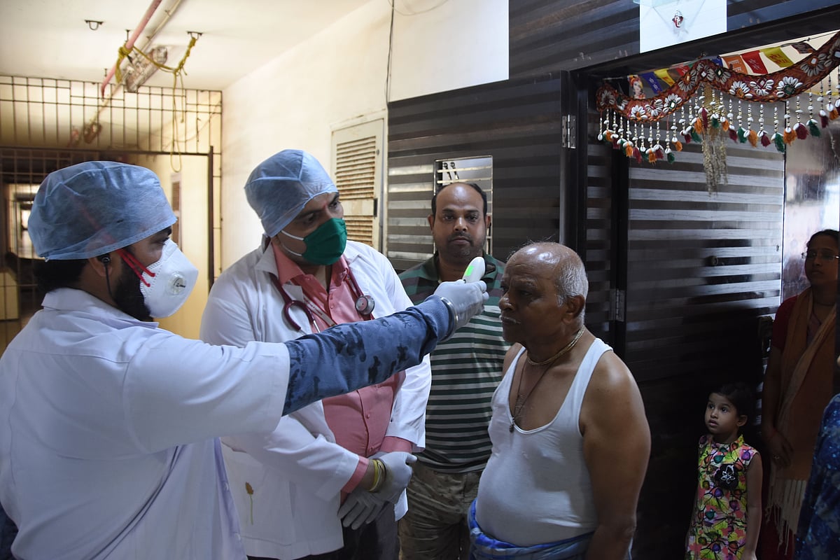 One rupee clinic checking door to door citizenís health by Thermal Screening status at mahalaxmi society in Lower Parel.