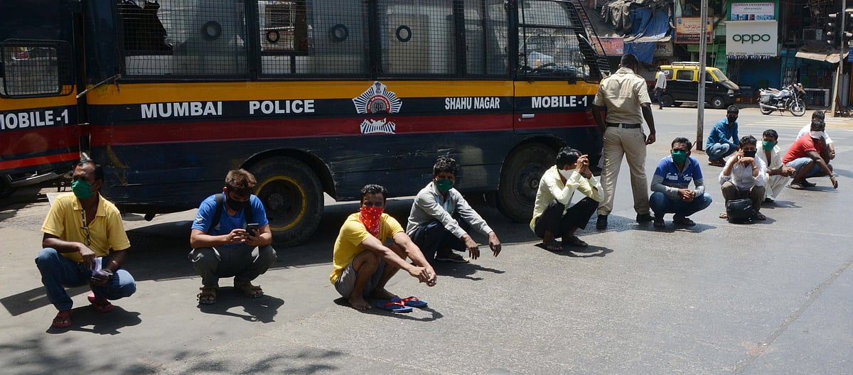 Mumbai police punish lockdown violators.