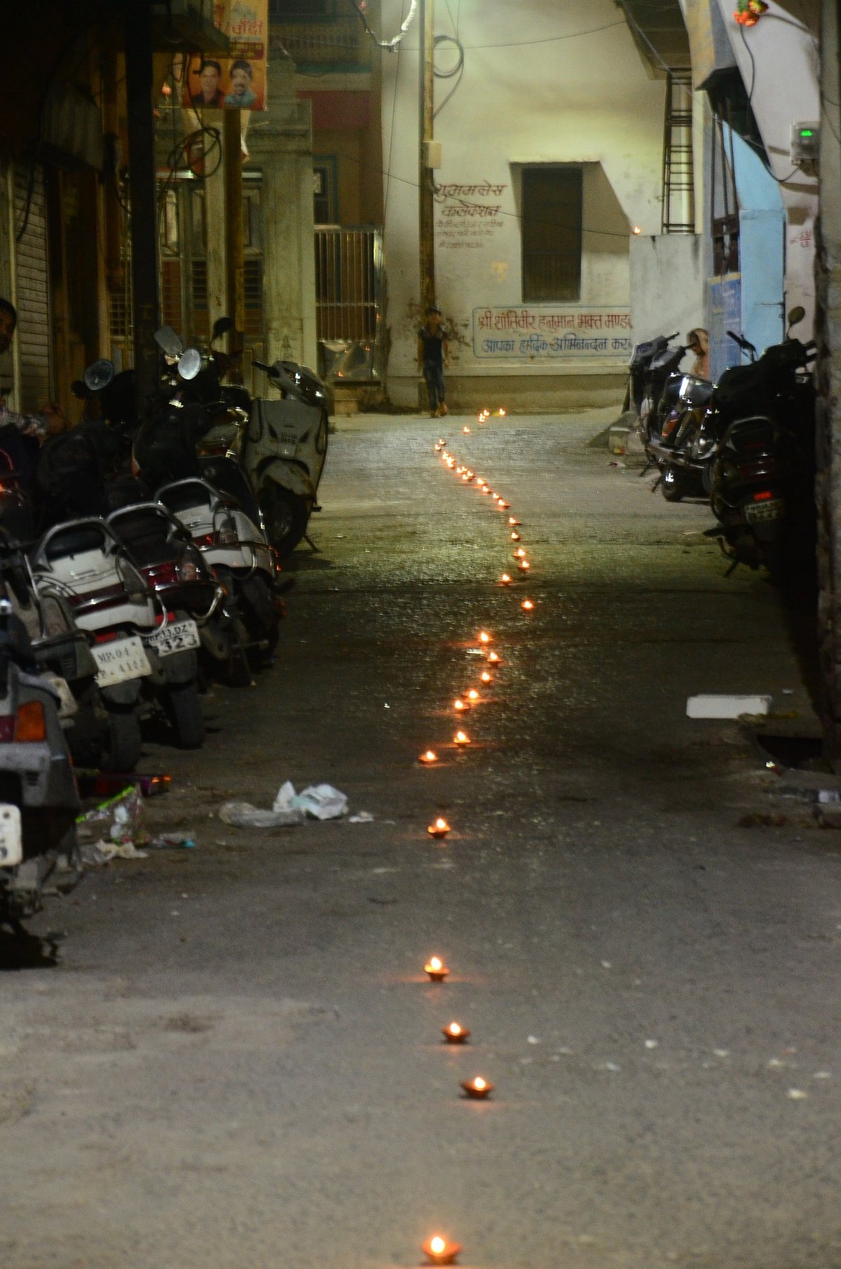  Residents of Old City area adjacent to Mahakaleshwar Temple put diyas between the nook and corners.  