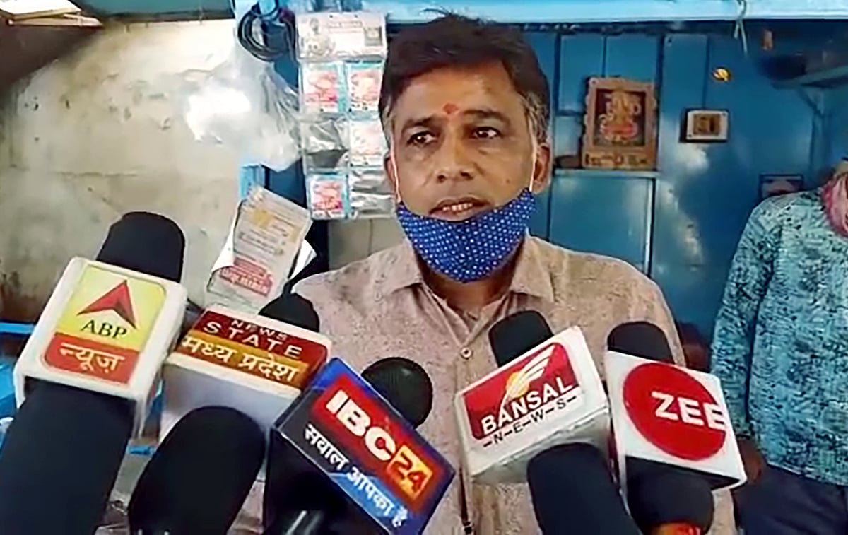 Suresh Gangwal, a tea stall owner speaks to media as his daughter Aanchal Gangwal graduated from the Indian Air Force Academy, at Neemuch district on Monday.
