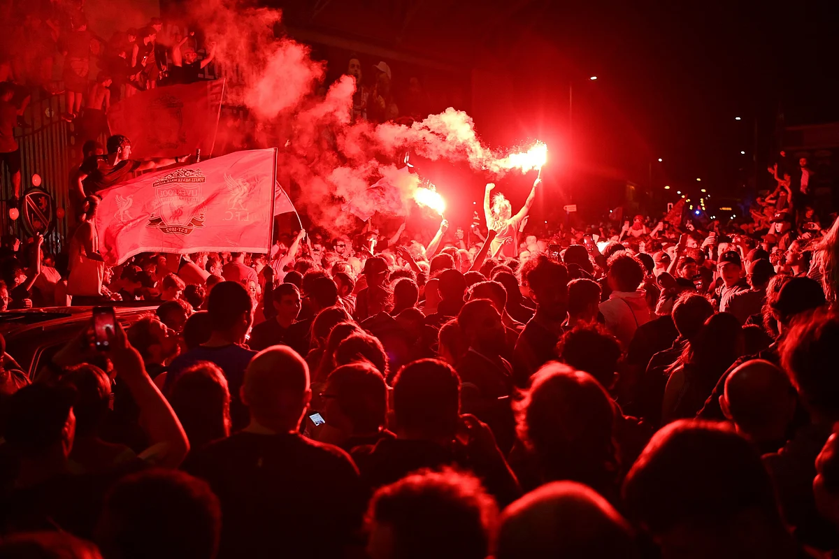 Liverpool fans outside Anfield stadium in Liverpool, north west England on June 25, 2020