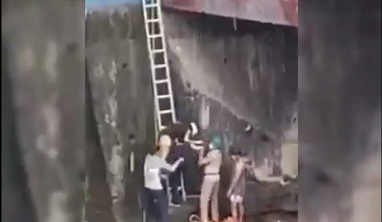 Mumbai fire brigade officials rescue 21-year-old woman who fell into Dahisar river