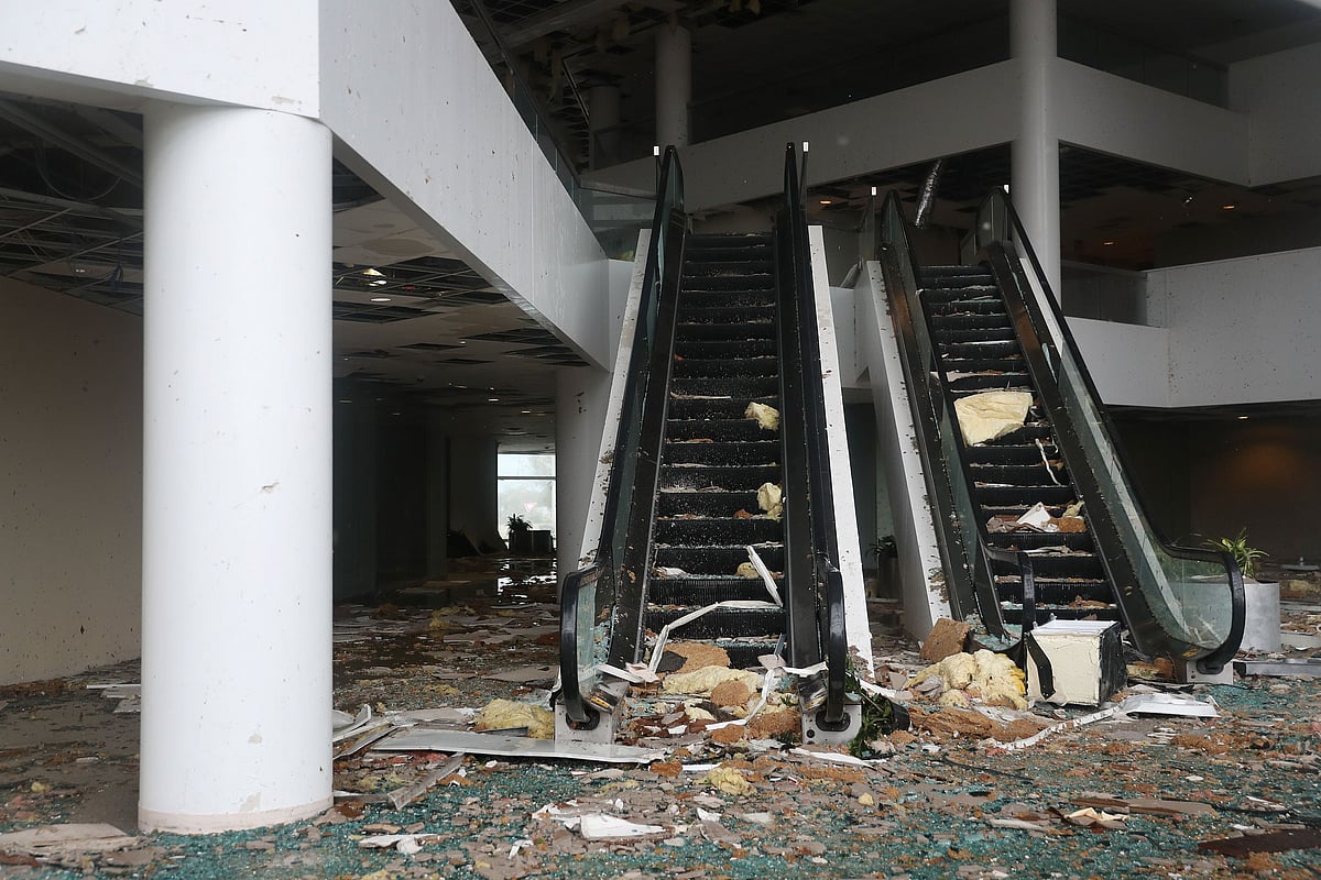 An escalator is seen in a building that had its windows blown in the downtown area after Hurricane Laura passed through on August 27, 2020 in Lake Charles, Louisiana
