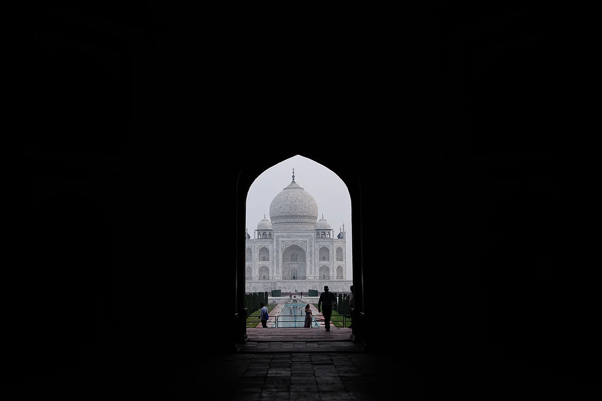 Tourists at the Taj Mahal in Agra on September 21, 2020. - The Taj Mahal reopens to visitors on September 21 in a symbolic business-as-usual gesture, even as India looks set to overtake the US as the global leader in coronavirus infections.