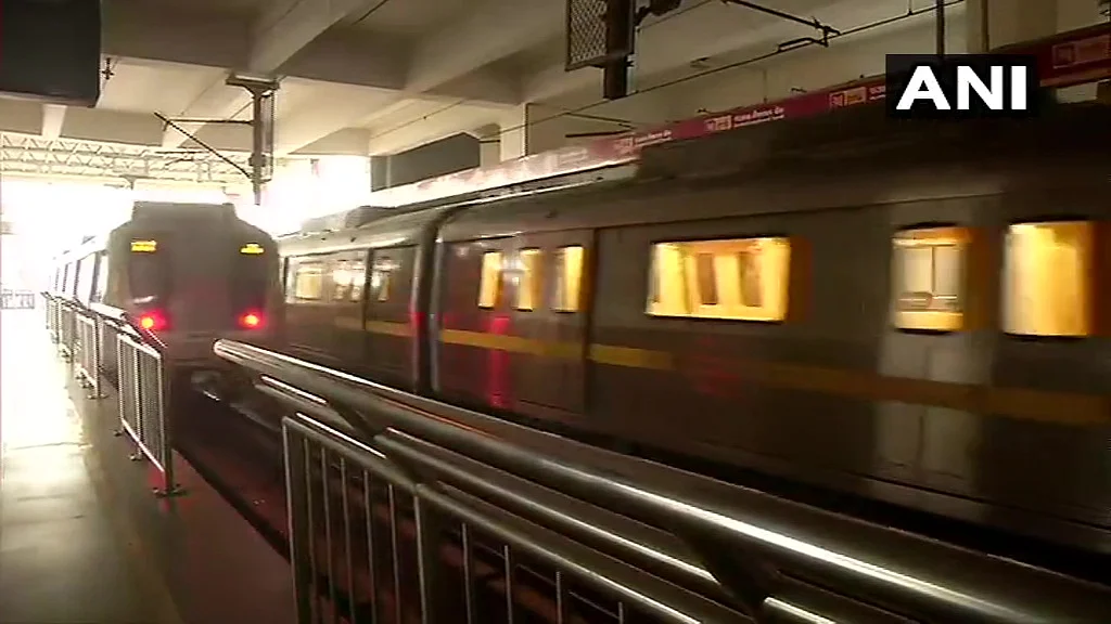 A metro train leaves from Huda City Centre metro station in Gurugram, Haryana for Samaypur Badli metro station in Delhi.