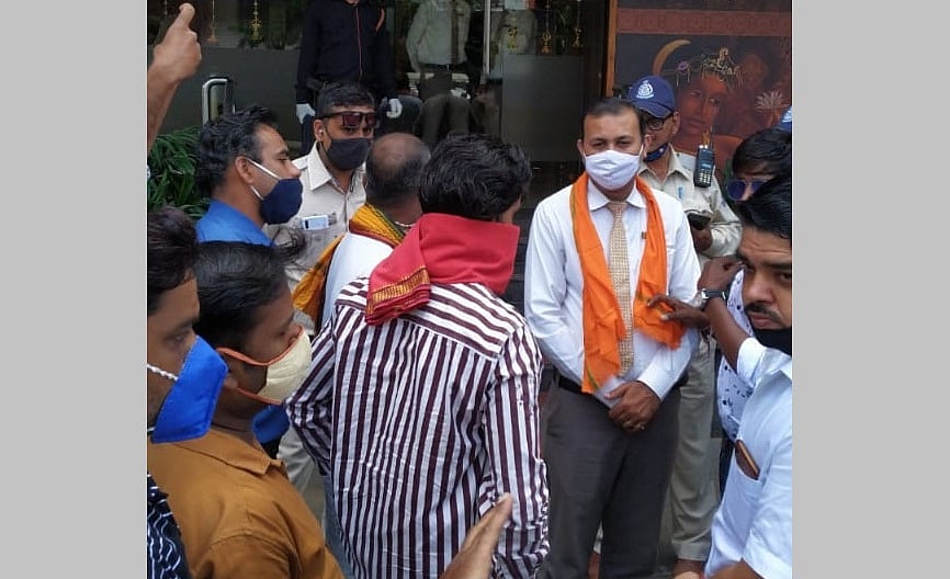 Tanishq Row: Activists of Hindu Jagran Manch demonstrate opposite showrooms of Tanishq in Indore