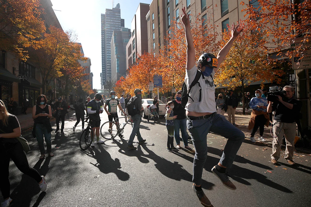 A man celebrates Saturday, Nov. 7, 2020, in Philadelphia, after Democrat Joe Biden defeated President Donald Trump to become 46th president of the United States.