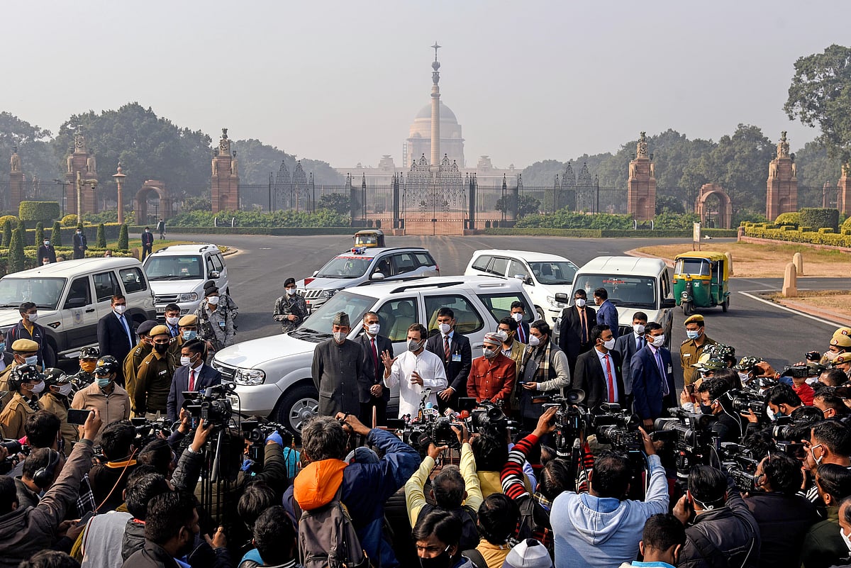 Congress leaders Rahul Gandhi speaks to media outside Rashtrapati Bhavan as he along with Ghulam Nabi Azad and Adhir Ranjan Chowdhury call on the President Ram Nath Kovind.