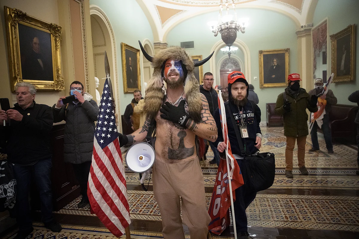 A pro-Trump mob confronts U.S. Capitol police outside the Senate chamber of the U.S. Capitol Building on January 06, 2021 in Washington, DC