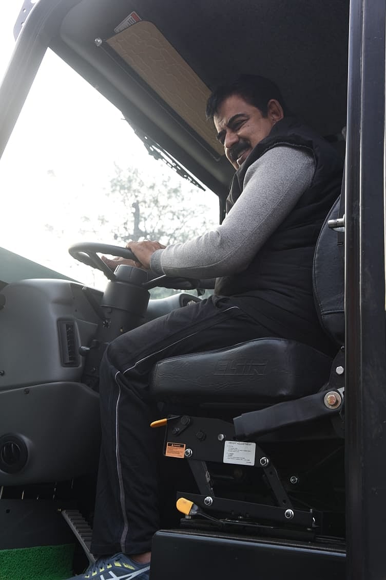 Indore MP Shankar Lalwani driving road sweeping machine  at Greater Kailash Road