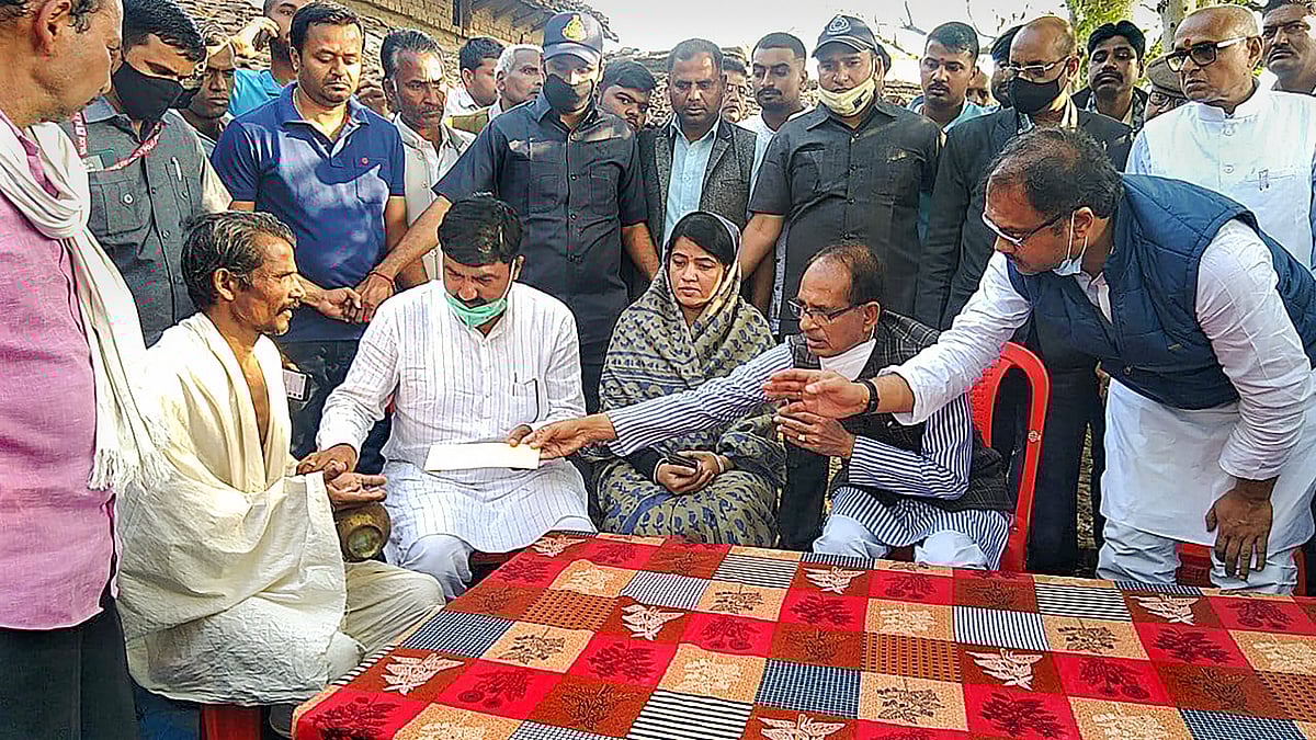 Madhya Pradesh Chief Minister Shivraj Singh Chouhan pays his condolence to the family members of bus accident victims