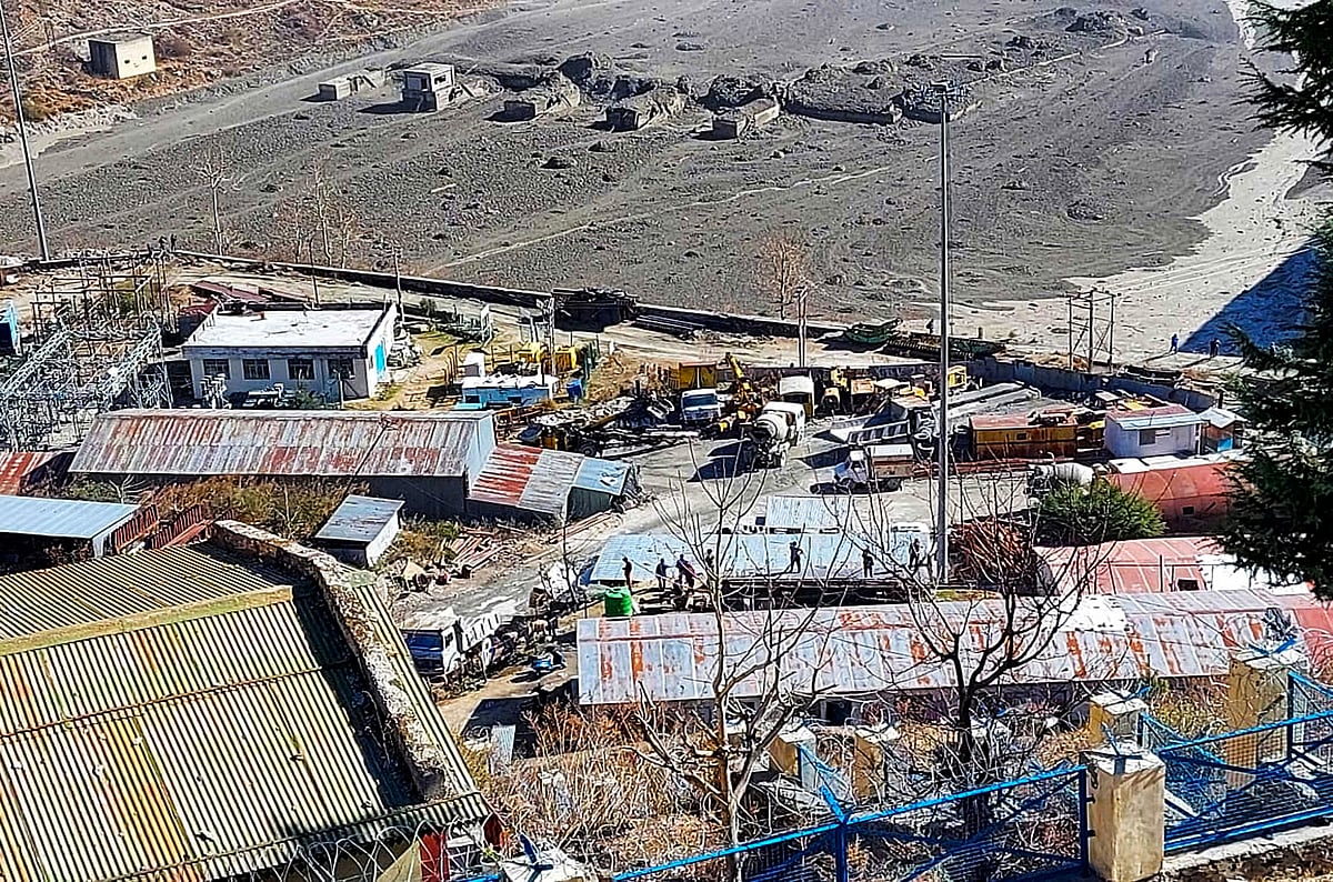 A massive flood seen near Reni village, where some water bodies flooded and destroyed many river bankside houses due to cloudburst or breaching of the reservoir, in Chamoli on Sunday.