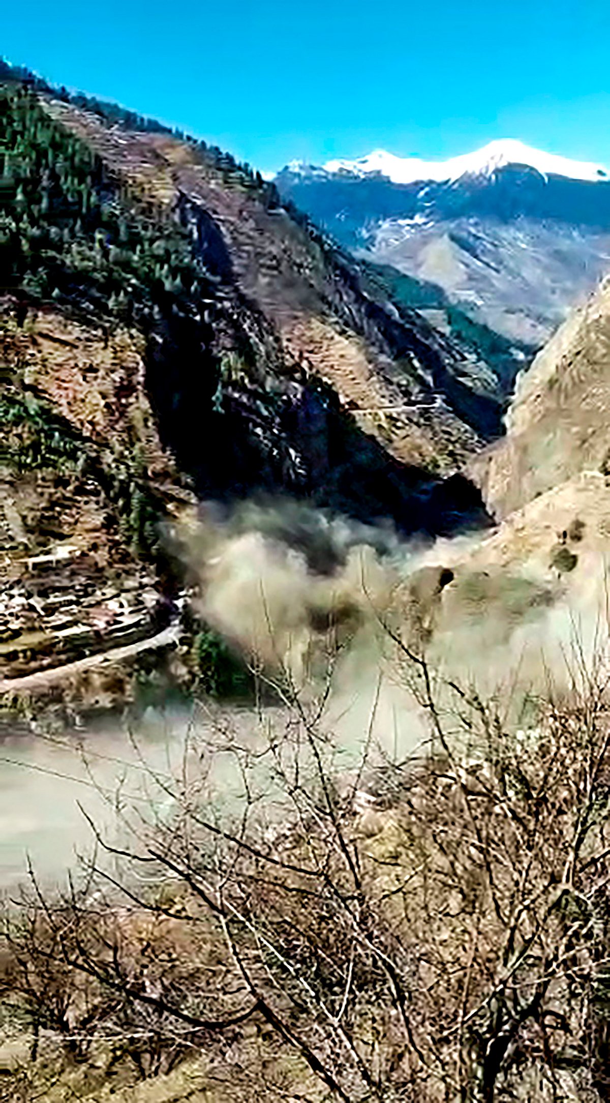 Chamoli: Avalanche after a glacier broke off in Joshimath in Uttarakhand?s Chamoli district causing a massive flood in the Dhauli Ganga river, Sunday, Feb. 7, 2021. More than 150 labourers working at the Rishi Ganga power project may have been directly affected.