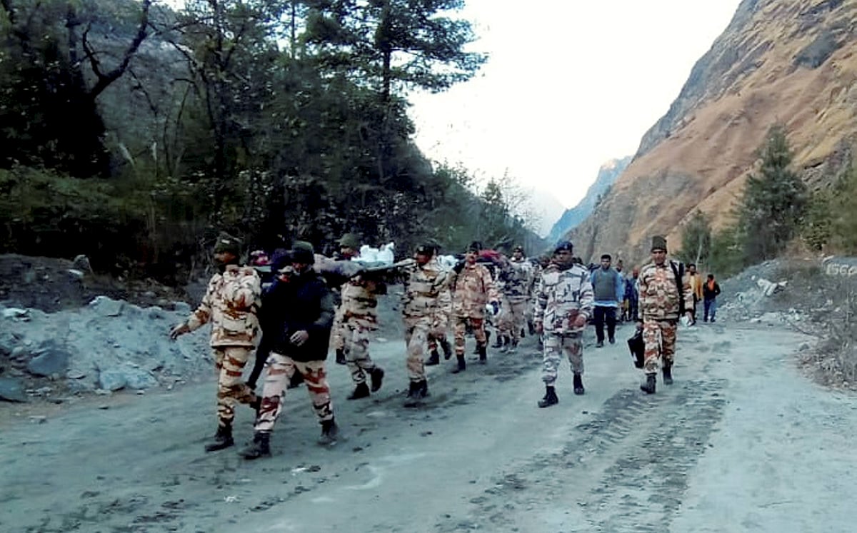 Chamoli: ITBP personnel carry out rescue operations, after a glacier broke off in Joshimath in Uttarakhand?s Chamoli district causing a massive flood in the Dhauli Ganga river, Sunday, Feb. 7, 2021. More than 150 labourers working at the Rishi Ganga power project may have been directly affected.