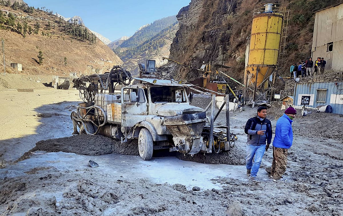 Chamoli: Locals inspect the site near damaged Dhauliganga hydropower project at Reni village, after a glacier broke off in Joshimath causing a massive flood in the Dhauli Ganga river, in Chamoli district of Uttarakhand, Sunday, Feb. 7, 2021. 