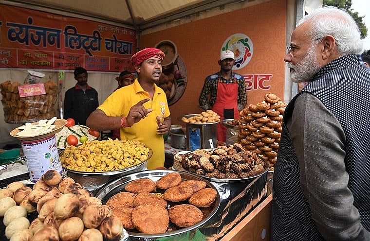 Prime Minister at Hunar Haat in New Delhi a year back