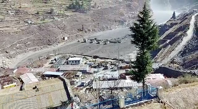 A massive flood in Dhauliganga seen near Reni village, where some water body flooded and destroyed many river bankside houses due to cloudburst or breaching of the reservoir on Sunday. 