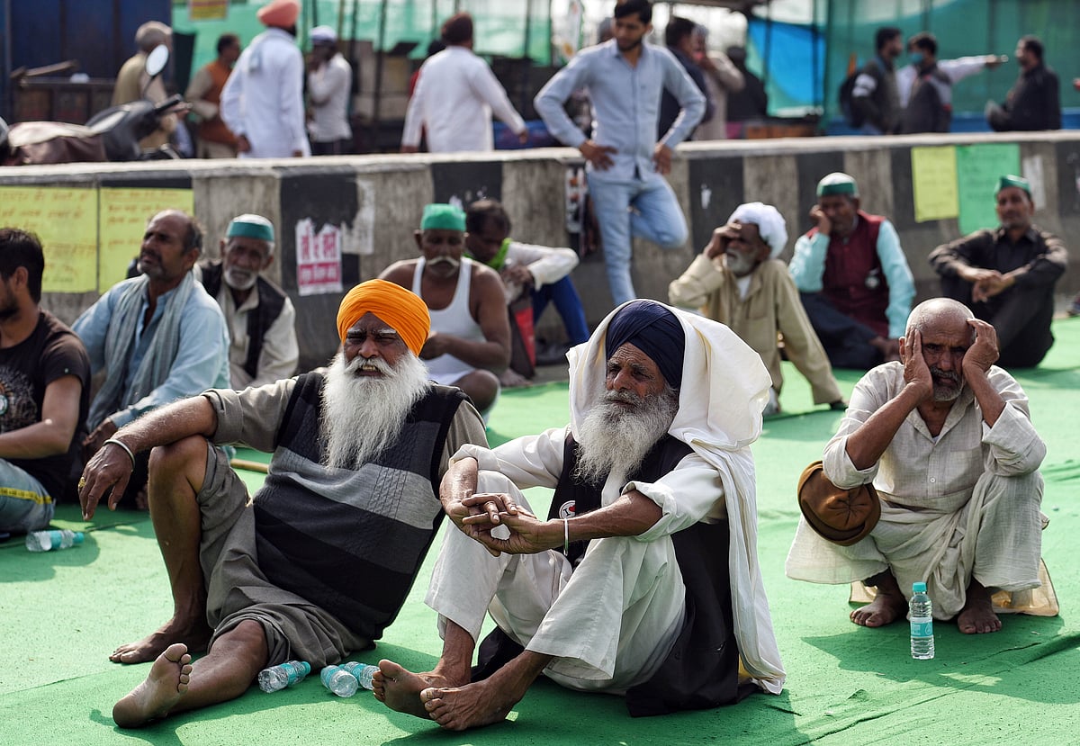 New Delhi, Feb 16 (ANI): Farmers at the site during their ongoing protest against new farm laws at Delhi-Ghazipur border, in Delhi.