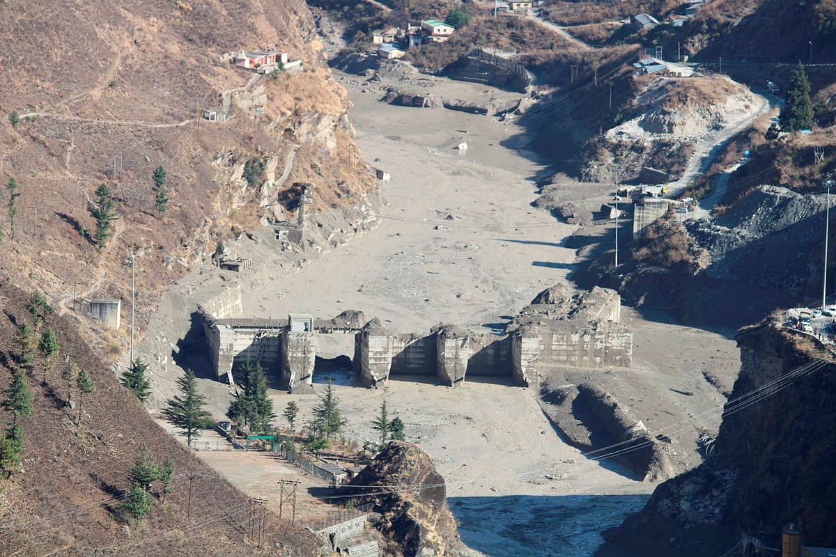 Damaged Dhauliganga hydropower project after a glacier broke off in Joshimath causing a massive flood in the Dhauli Ganga river, in Chamoli district of Uttarakhand, Sunday, Feb. 7, 2021.