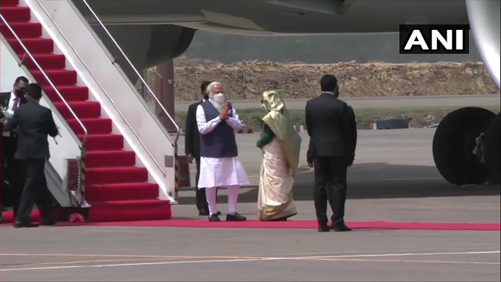 Prime Minister of Bangladesh, Sheikh Hasina receives PM Narendra Modi. Visuals from Hazrat Shahjalal International Airport in Dhaka.