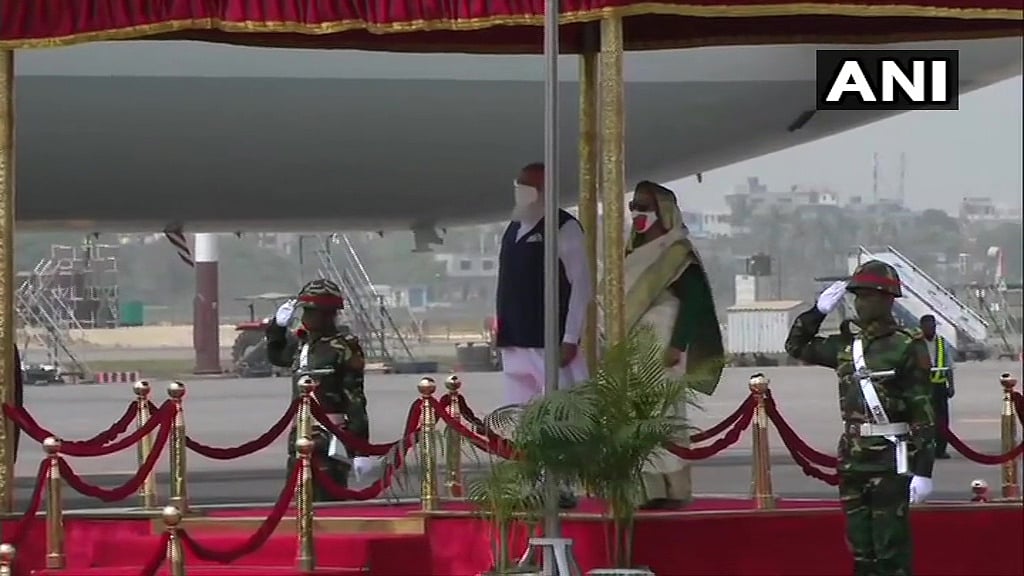 Prime Minister Narendra Modi being accorded Guard of Honour upon his arrival in Bangladesh. Visuals from Hazrat Shahjalal International Airport in Dhaka.
