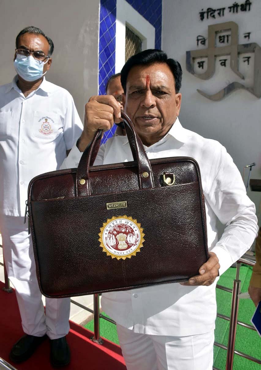 Madhya Pradesh Finance Minister Jagdish Devdas arrives to present the budget of the state for the year 2021-22 in Bhopal on Tuesday. 