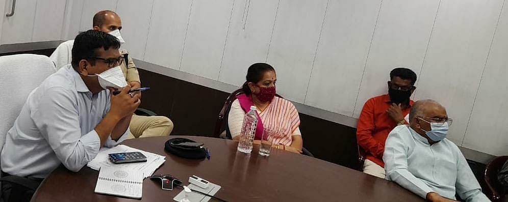 Former cabinet minister Archana Chitnis and other senior officials from Burhanpur district attending meeting at the district headquarters on Monday