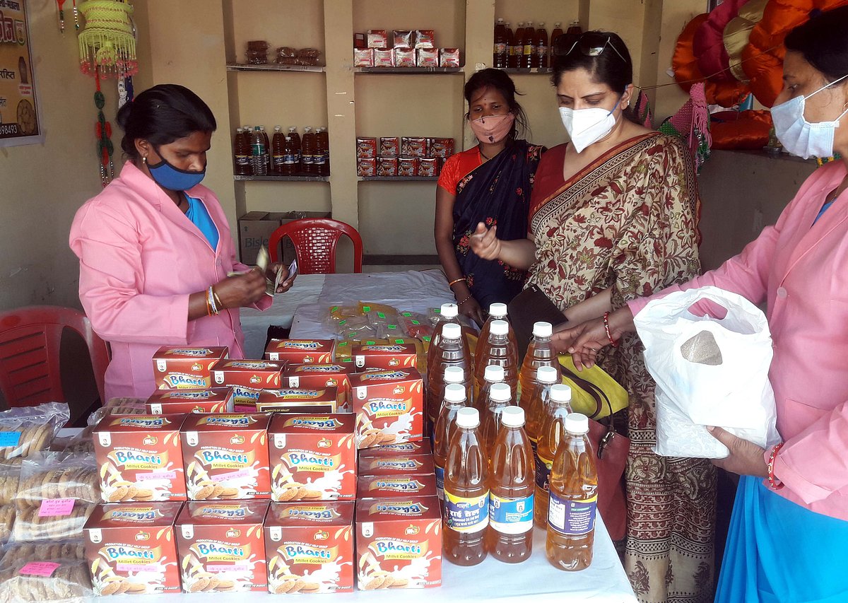 A women SHG showcasing Kodu-Kutki cookies prepared in desi ghee and butter in  an exhibition-cum-sale 'Hunar Haat' at Bhopal Haat in the city.
