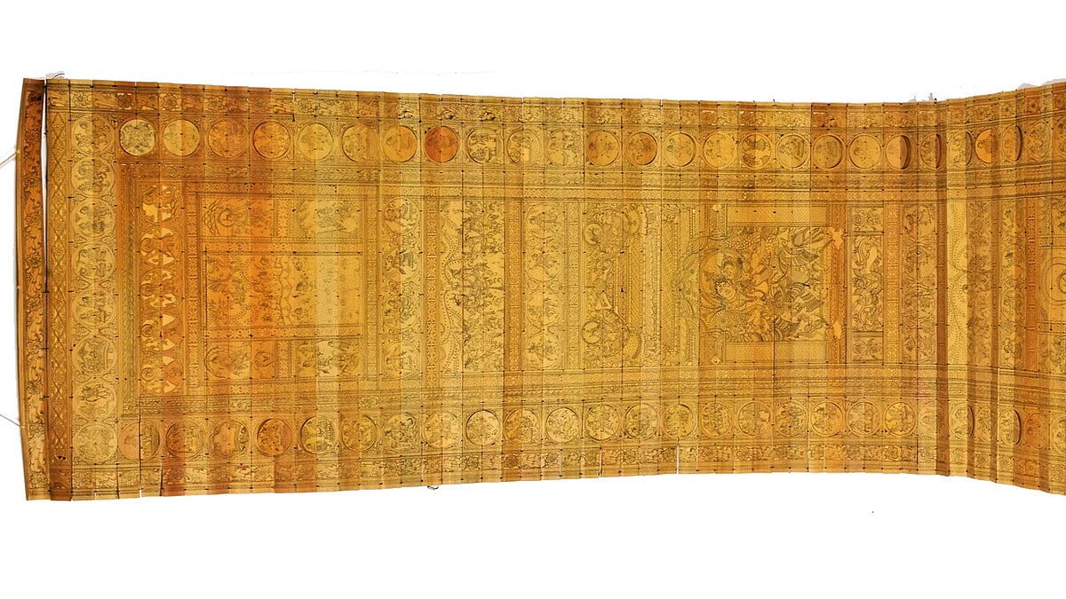 Pattachitra- Stitched palm leaves carved with fine black thread