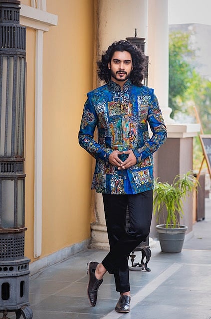 Team up an indigo coat with dapper trousers to stand out in the crowd