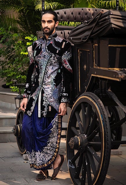 A classic indigo coloured dhoti paired with black jacket