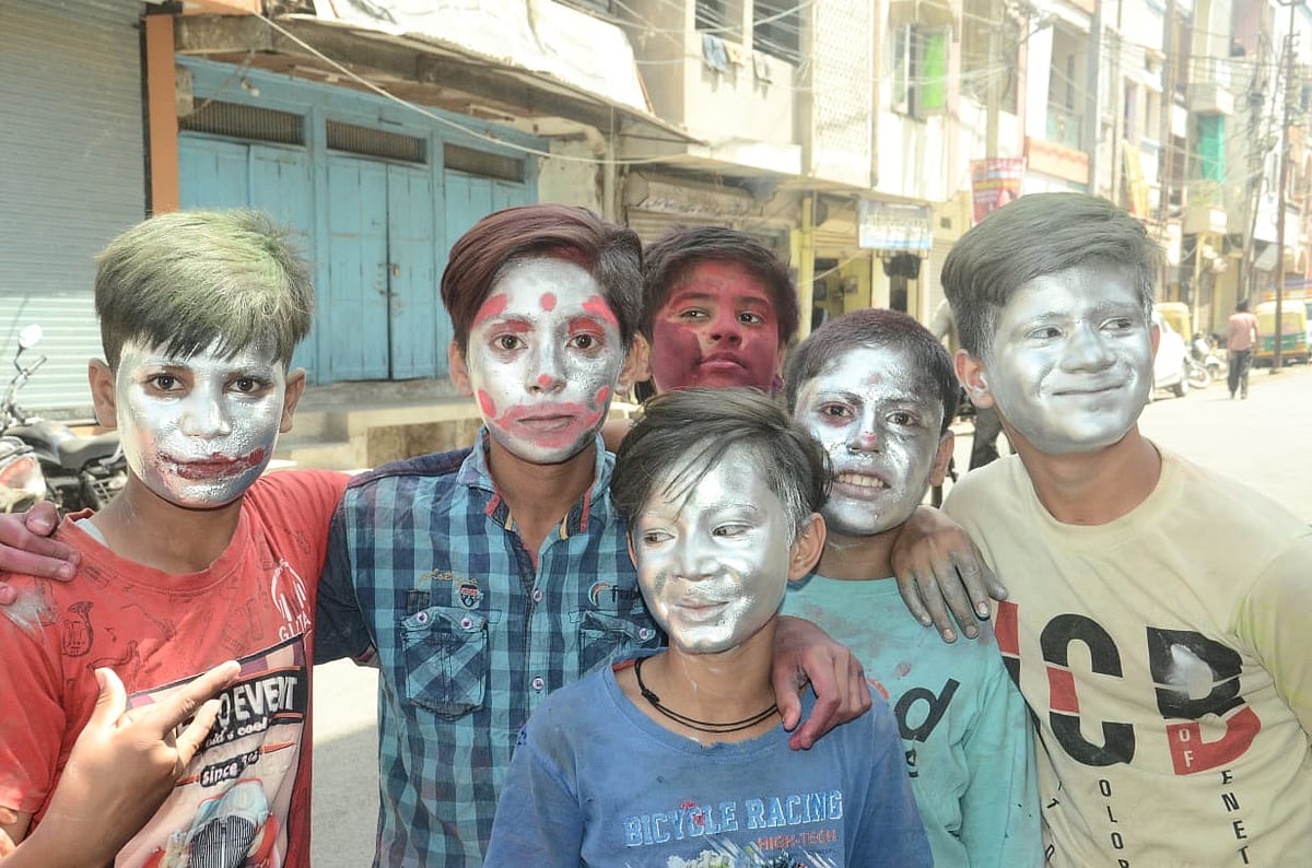 Children with silver paint on Rangpanchami  in Ujjain on Friday