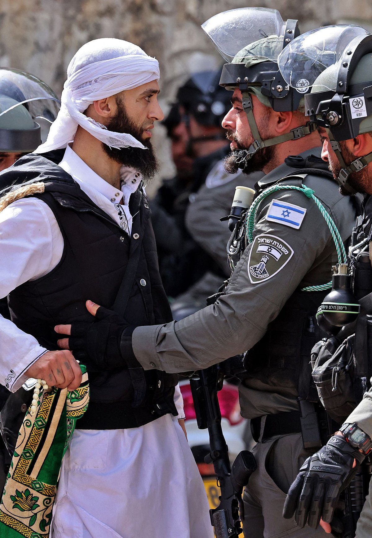 A Palestinian argues with Israeli security forces in Jerusalems Old City on May 10, 2021, ahead of a planned march to commemorate Israels takeover of Jerusalem in the 1967 Six-Day War.