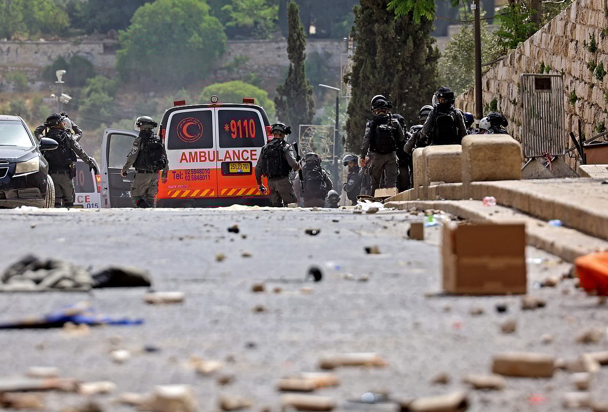 Palestinians clash with Israeli security forces in Jerusalems Old City on May 10, 2021, ahead of a planned march to commemorate Israels takeover of Jerusalem in the 1967 Six-Day War.