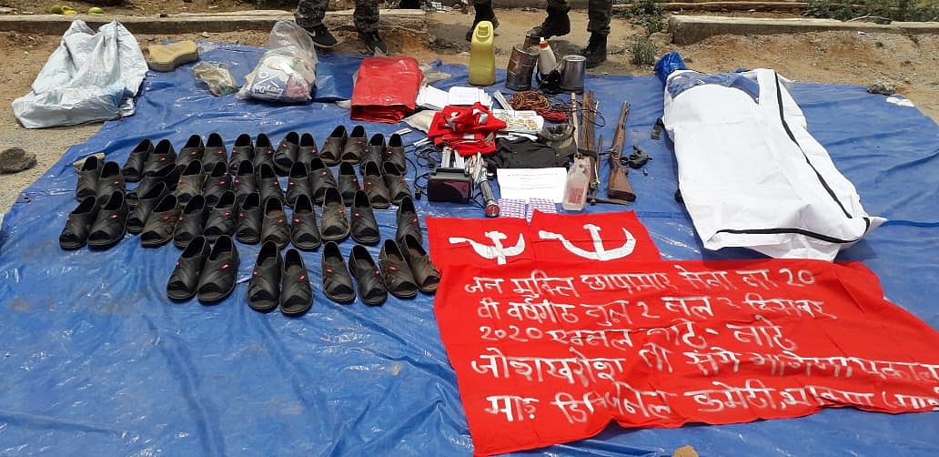 Two country-made guns, one axe, an Improvised Explosive Device (IED) weighing 2 kg, other Maoist materials, slippers, banners, medicines and items of daily use were also recovered from the encounter site.
