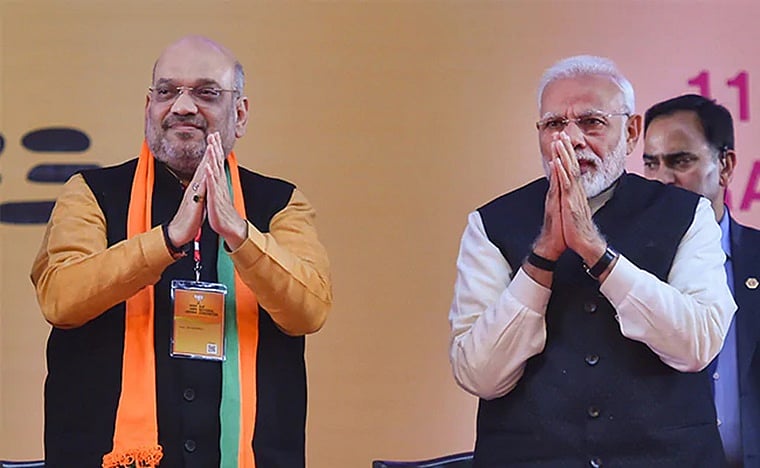 PM Modi, Amit Shah congratulate Himanta Biswa Sarma on taking oath as Assam CM 