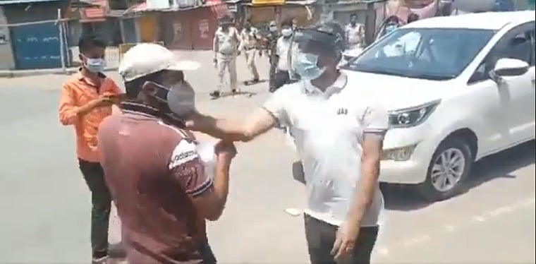 District collector slaps youth, smashes his phone for violating lockdown norms in Chhattisgarh;...