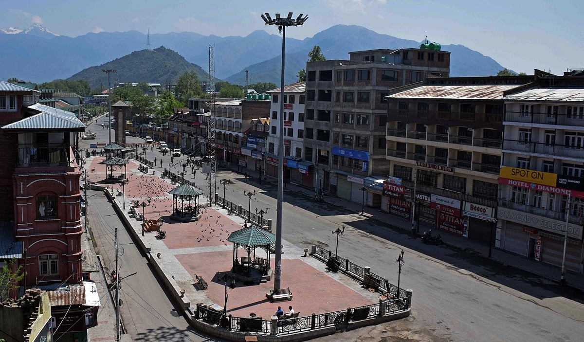 Deserted road during corona Curfew in Srinagar, Kashmir. As the COVID-19 cases continue to rise the authorities imposed strict Corona curfew across Jammu and Kashmir in order to stop further spread of Coronavirus.