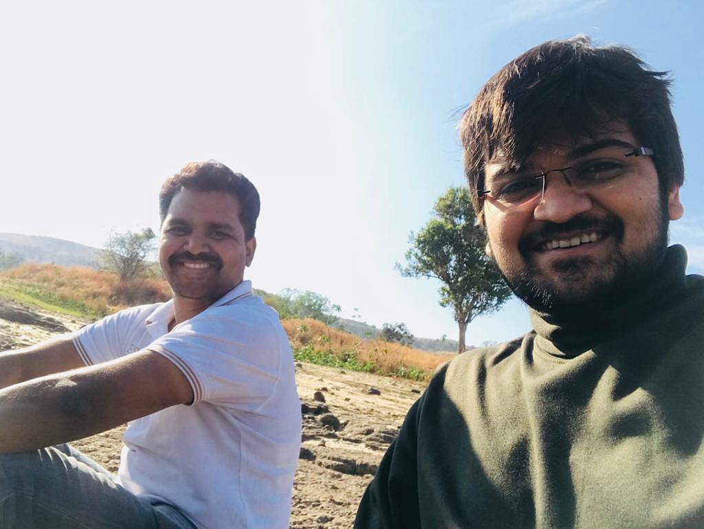Sanket Mehta (in green) and Ganesh Nikam (in white t-shirt)