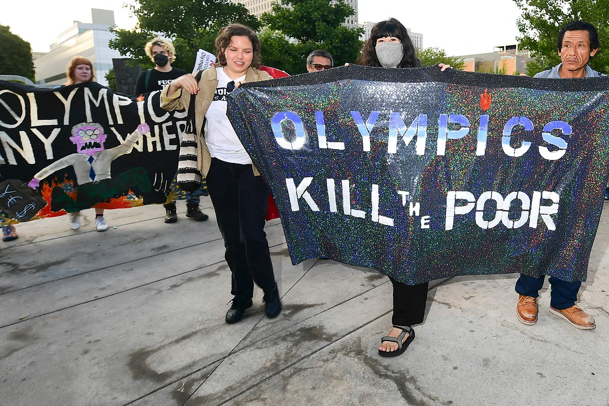Members of NOlympics LA and their supporters gather in Little Tokyo in Los Angeles, California on June 22, 2021 calling for the cancellation of the Tokyo 2020 Olympics.