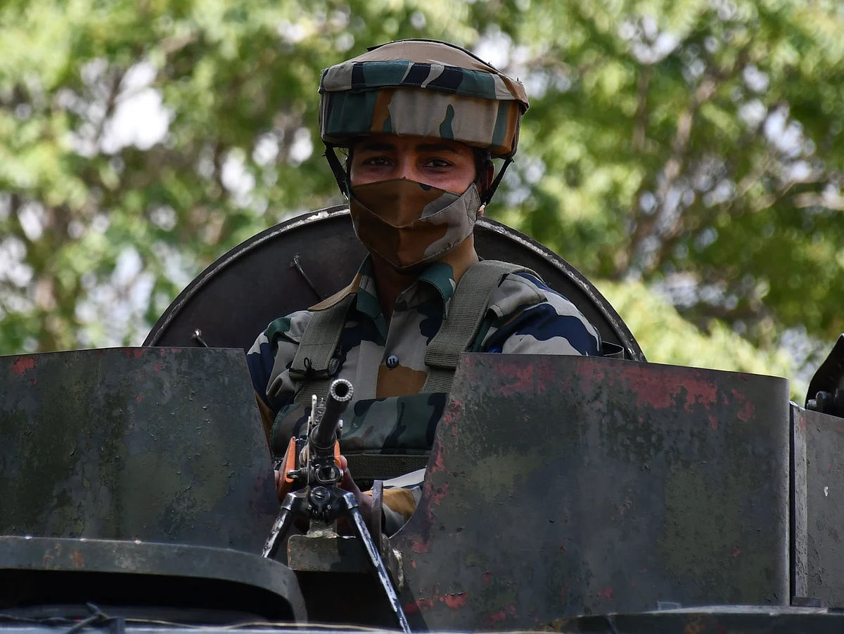 The soldiers seen inside an armoured vehicle at Wasun, in Ganderbal district of Kashmir.