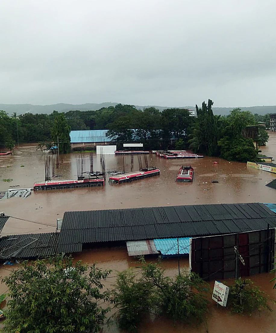 Vehicles submerged in the flodded water due to heavy rainfall, in Ratnagiri on Thursday.