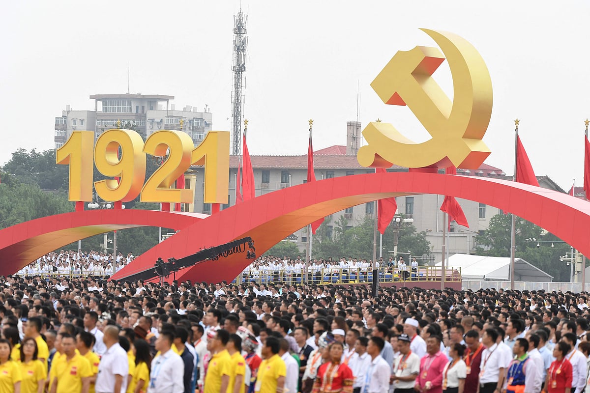 People attend the celebrations of the 100th anniversary of the founding of the Communist Party of China at Tiananmen Square in Beijing on July 1, 2021.