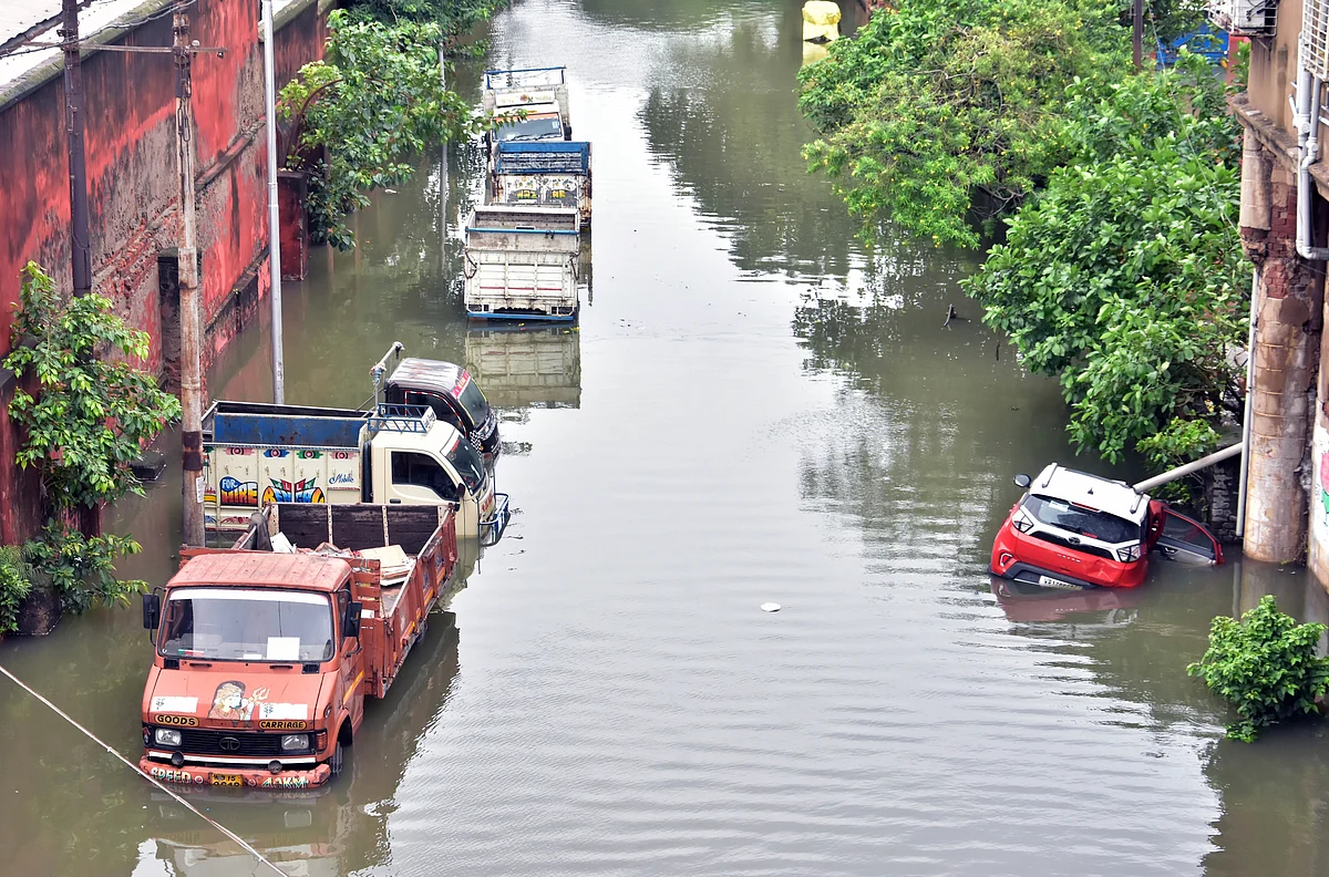 West Bengal, July 30 (ANI): Vehicles submerged on a waterlogged street after heavy rainfall, in Howrah on Friday.