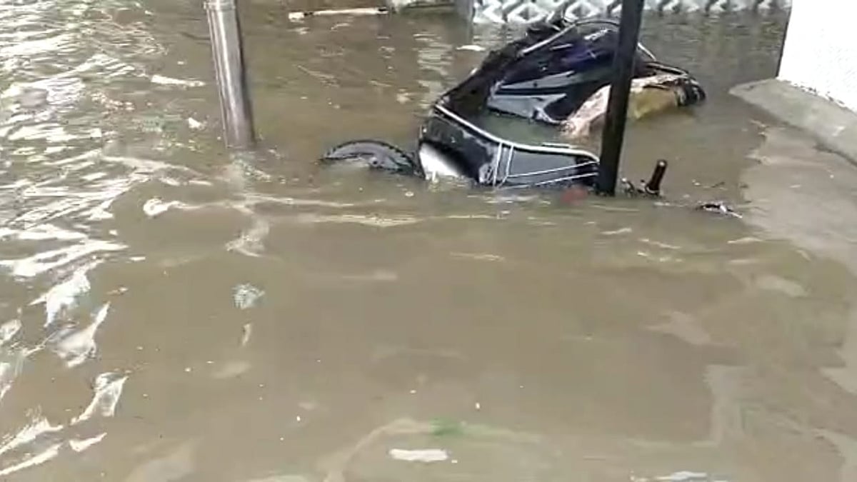 A scooty parked on a street submerges into water at Hindmata, Lower Parel as heavy rainfall causes water-logging on Friday, July 16, 2021.